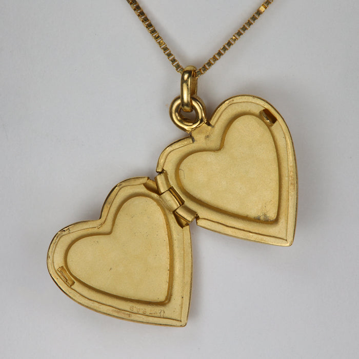 interior heart locket yellow gold