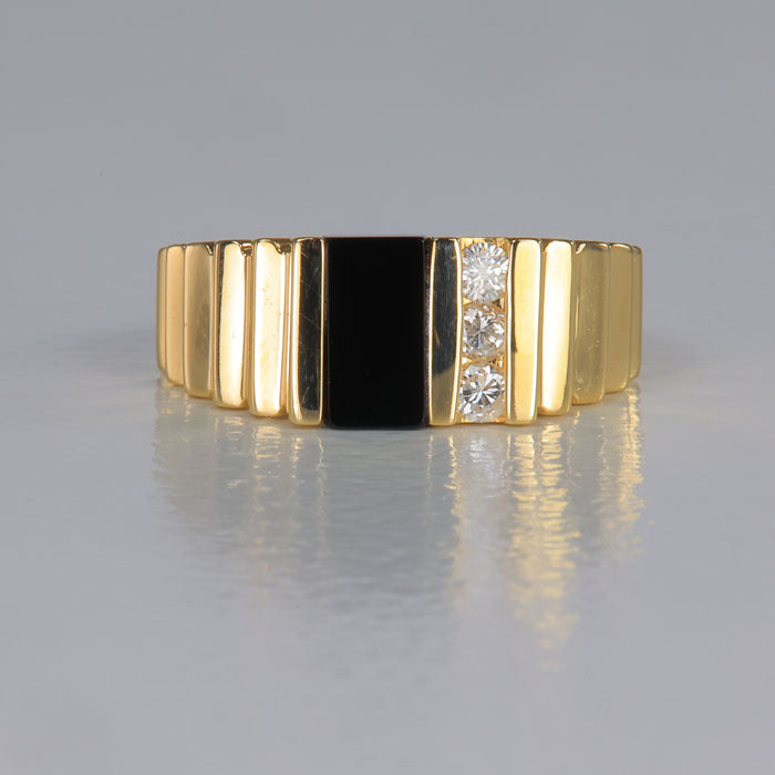 onyx ring with diamond accents in yellow gold