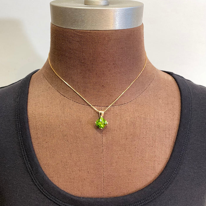 peridot pendant on form