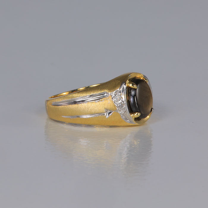yellow and white gold ring with star sapphire and diamond accents