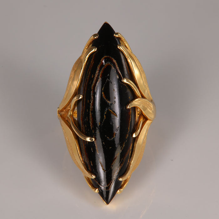 likely ebony adjustable shank ring yellow gold