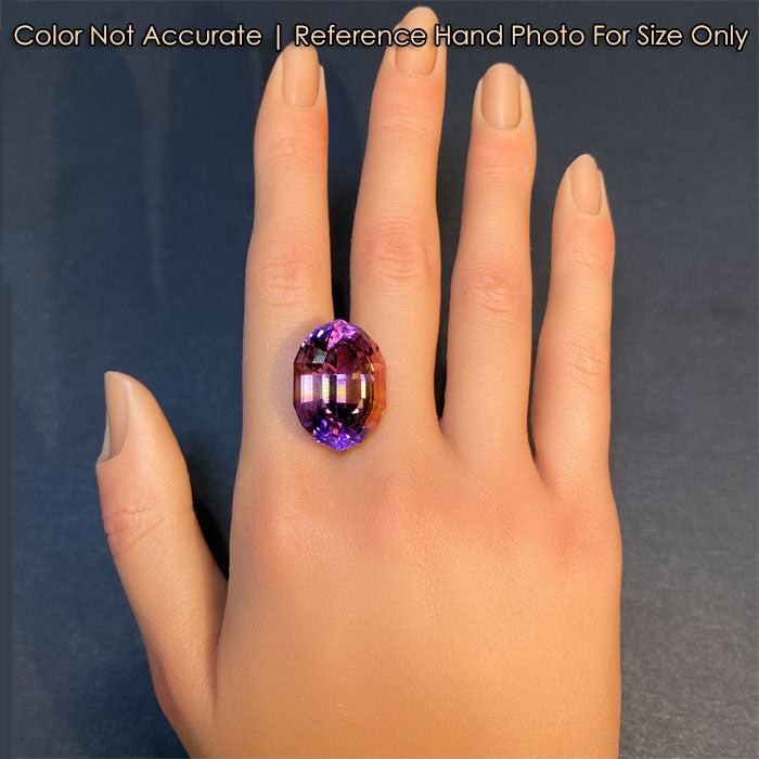 purple yellow bi color ametrine on hand