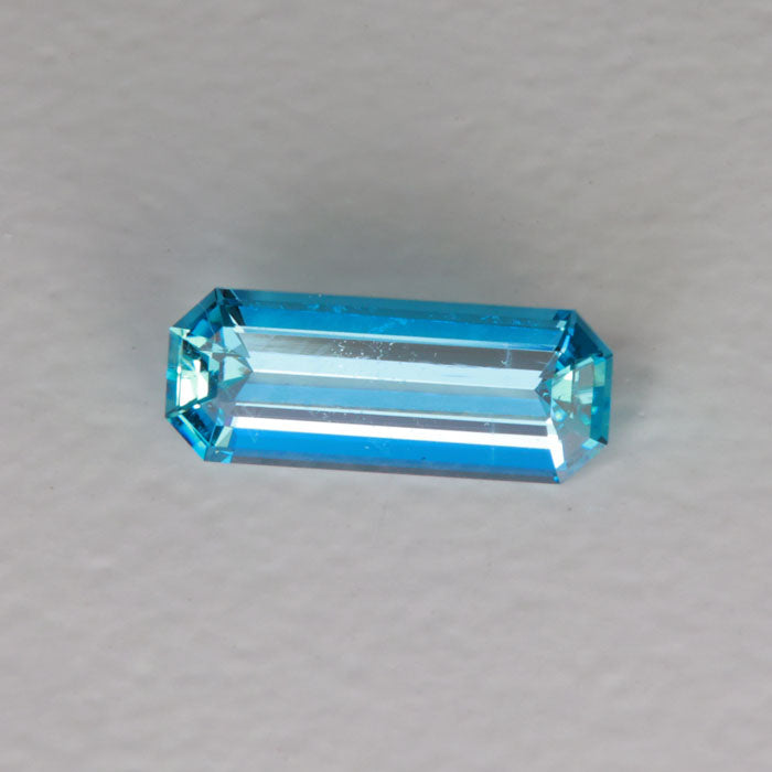 greenish blue aquamarine gemstone emerald cut