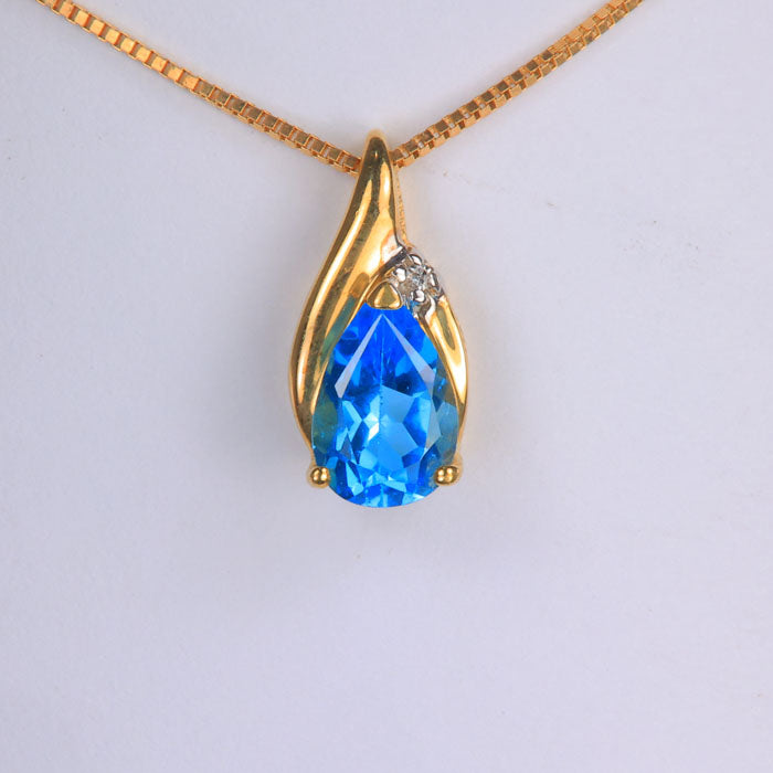 estate pendant yellow gold blue topaz gemstone diamond accent