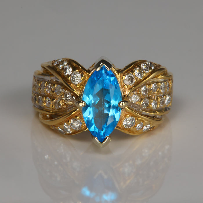 marquise cut blue topaz ring yellow gold