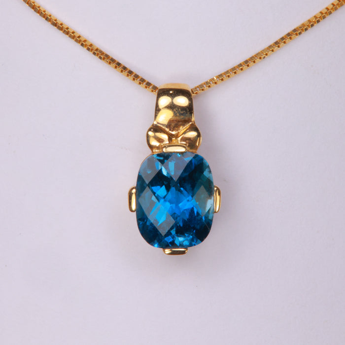 yellow gold blue topaz pendant 