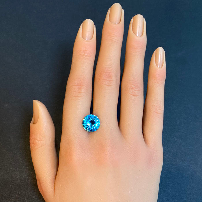 blue zircon gemstone round brilliant