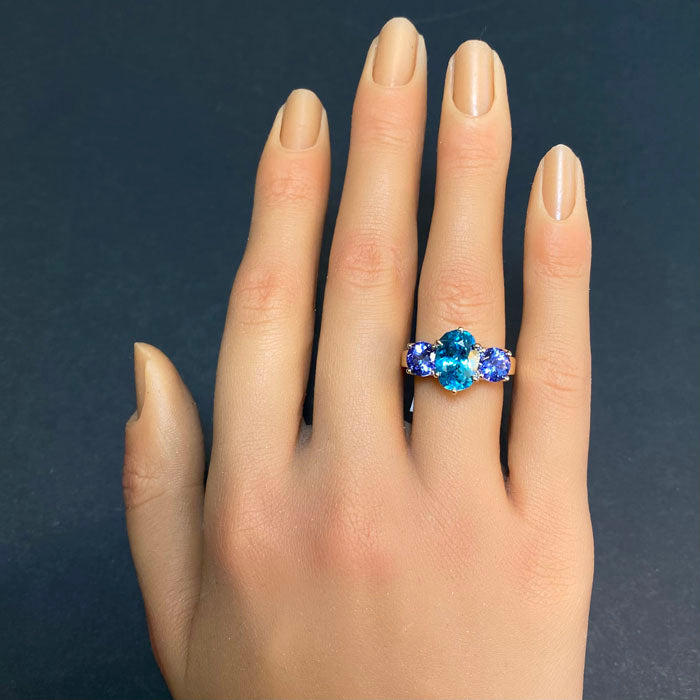 statement ring blue zircon and tanzanite in yellow gold