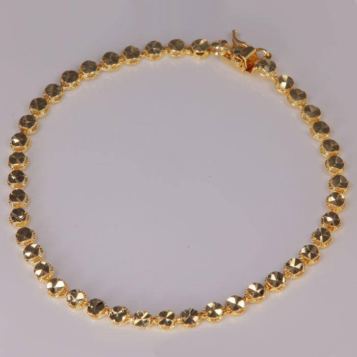 yellow gold Beverly Hills Gold bracelet diamond cut design