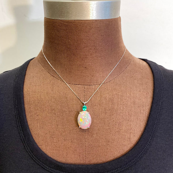 opal and emerald pendant in white gold 