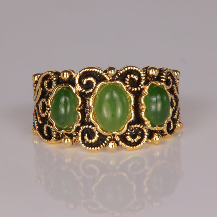 jade and yellow gold estate ring with filigree detailing