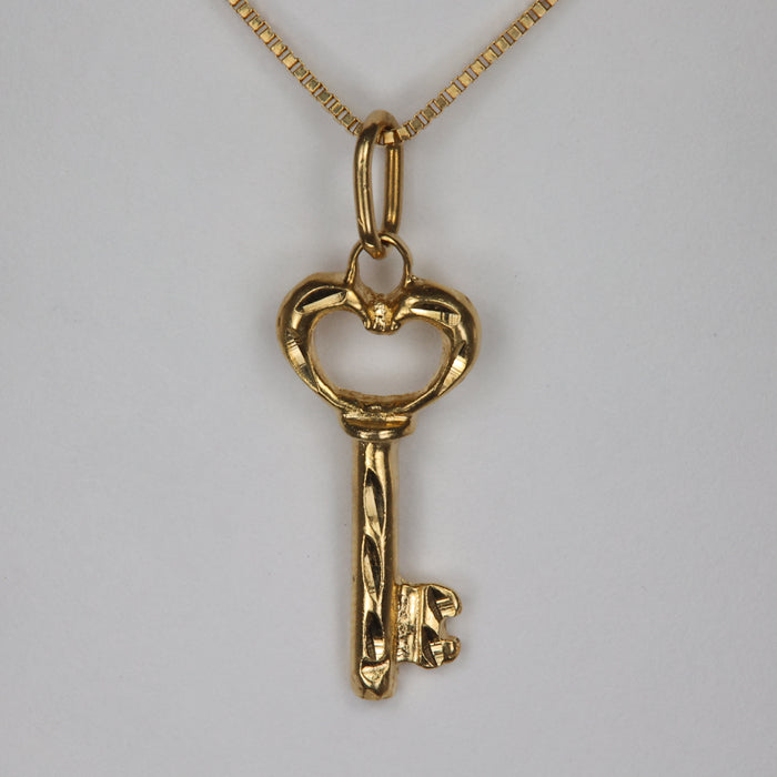 yellow gold heart key pendant