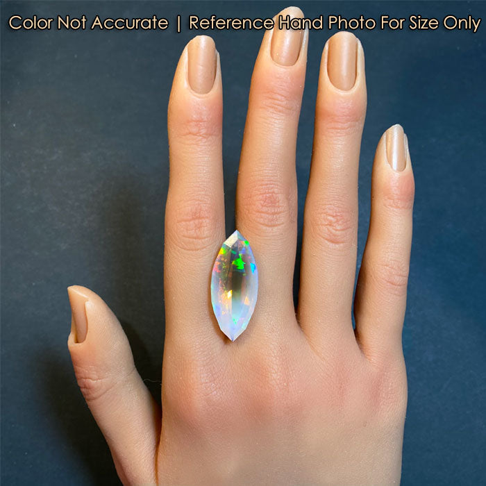 opal gemstone marquise cut on hand 