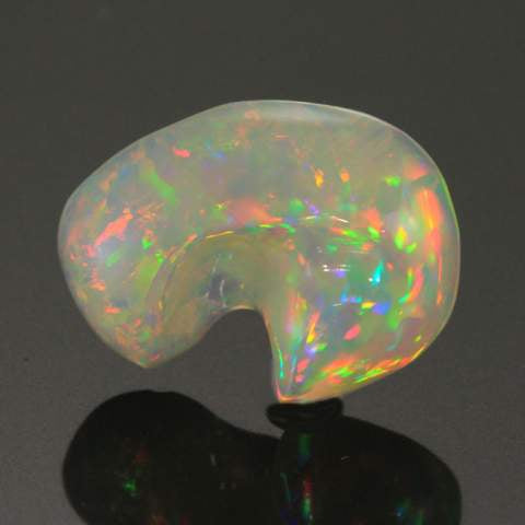 freeform carved cabochon opal gem