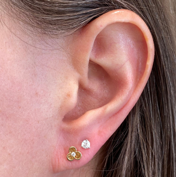 diamond in yellow gold stud earrings