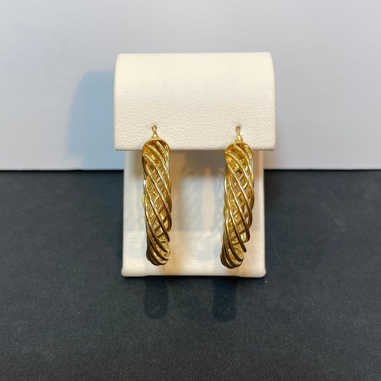 spiral yellow gold hoop earrings