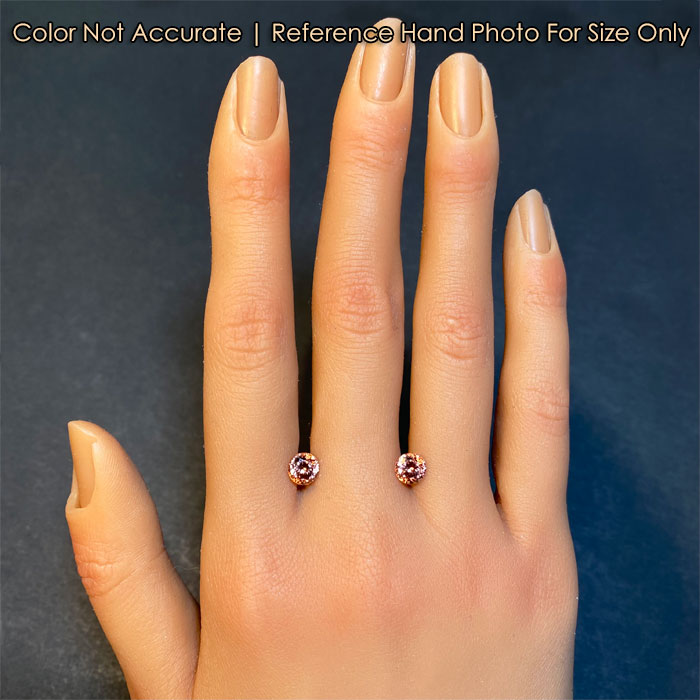 peach pair of zircons on hand