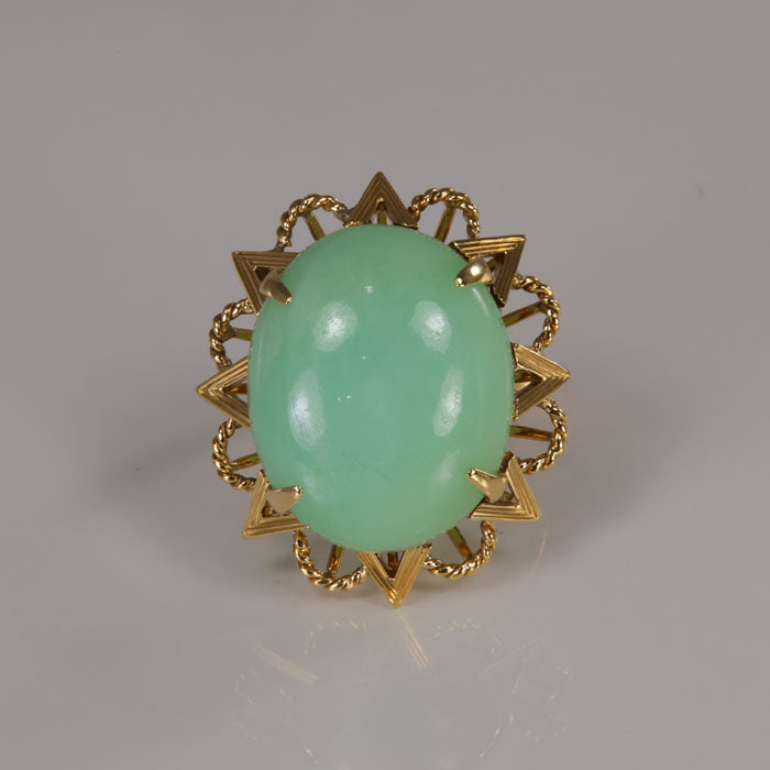 oval cabochon cut light green jade cocktail ring yellow gold