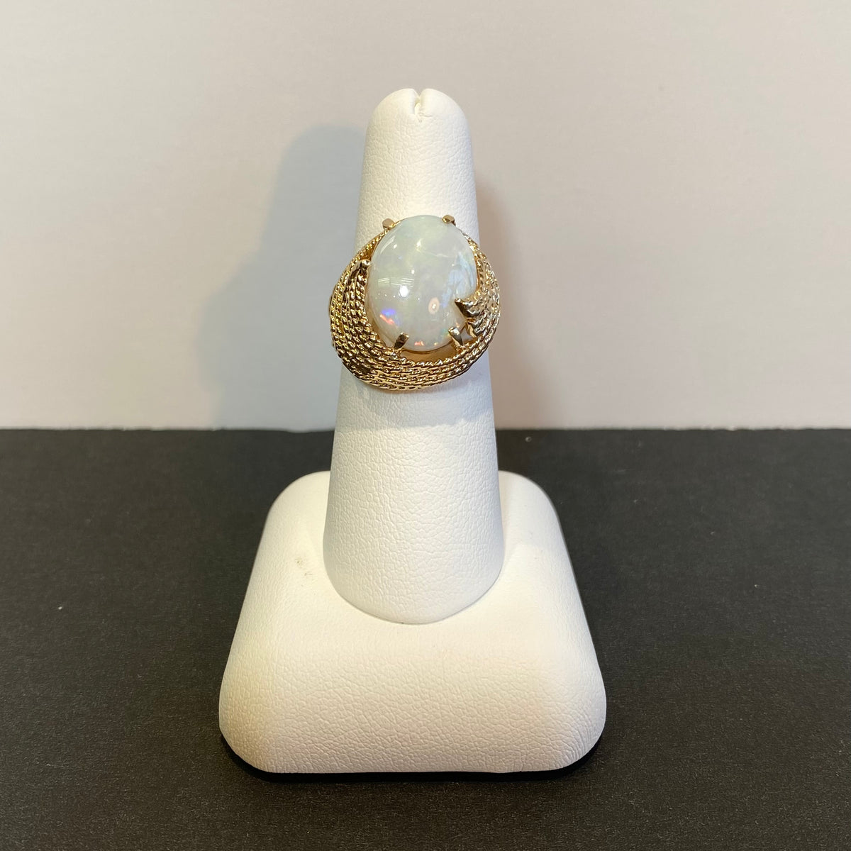 opal cabochon yellow gold ring