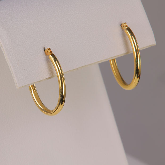 hoop earrings oval shape in yellow gold