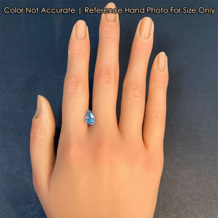 deep blue color aquamarine gemstone on hand