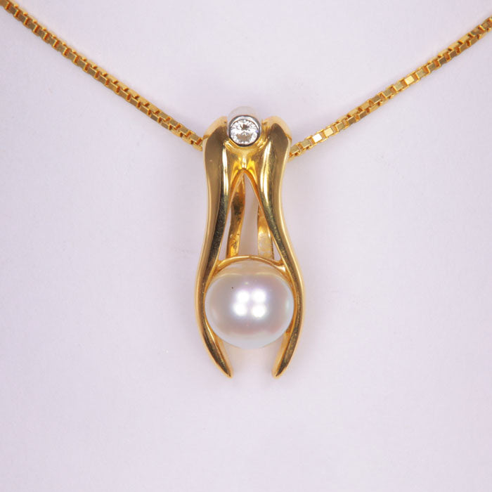 yellow gold pearl and diamond pendant