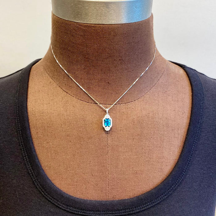 gemstone pendant in white gold blue zircon diamonds