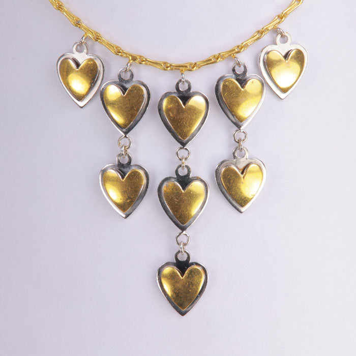 white and yellow gold heart necklace pincetta chain