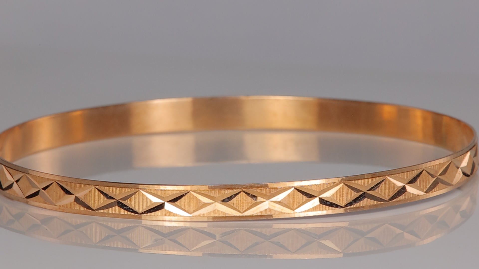 14K Yellow Gold Diamond Cut X Bangle Bracelet