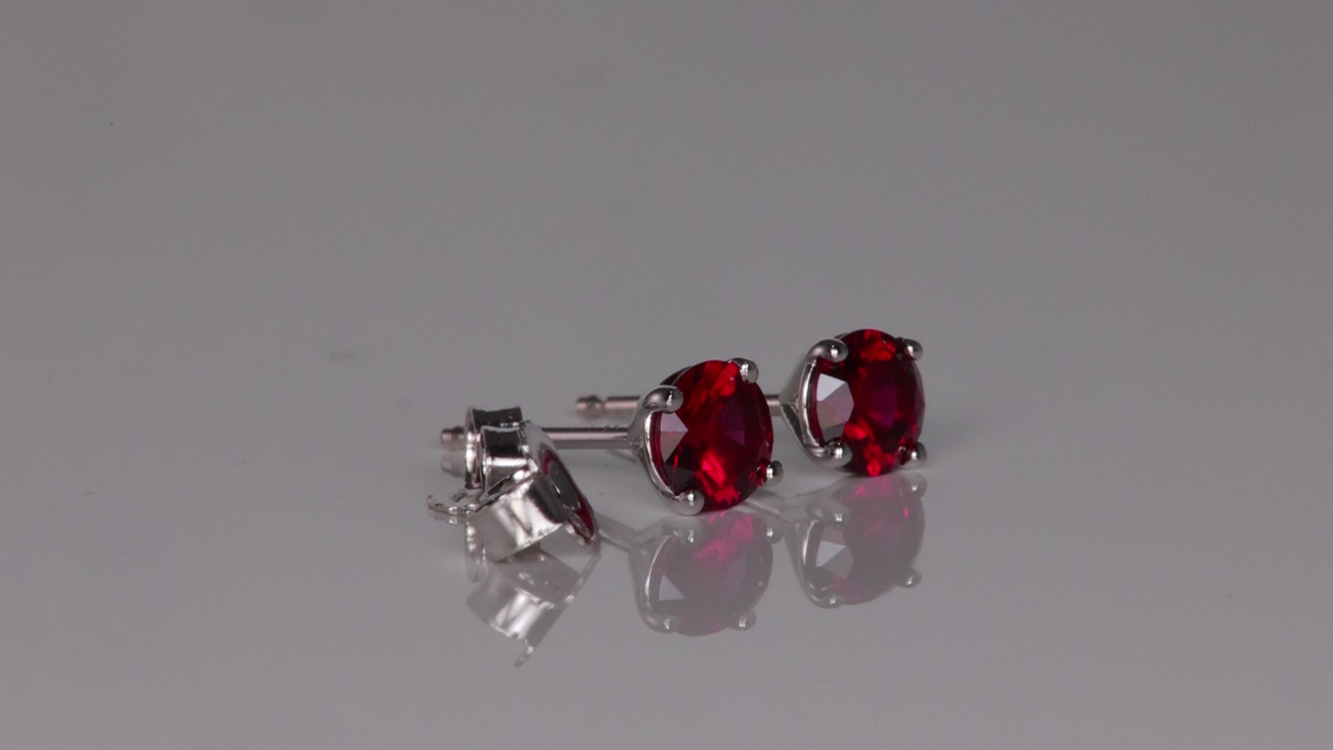 14K White Gold Pyrope Garnet Stud Earrings .74 Carats