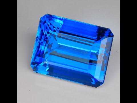 HIDDEN GEM Big Super Blue Topaz Emerald Cut 98.88ct