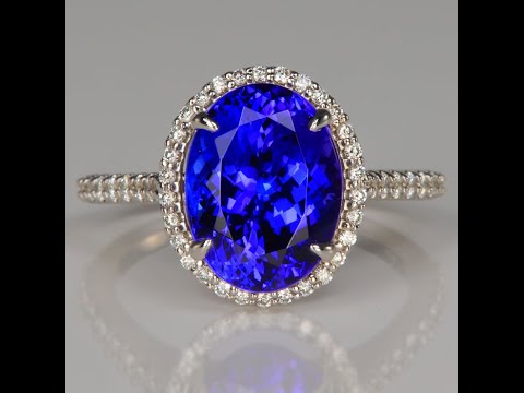 18K White Gold Oval Tanzanite and Diamond Halo Ring 5.39 Carats