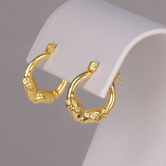 yellow gold hoops with rams head