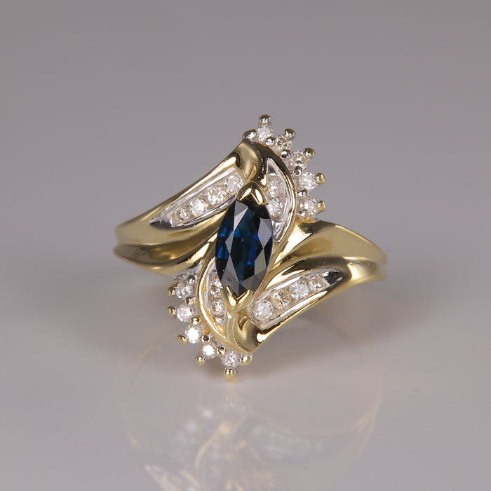 sapphire and diamond ring in yellow gold