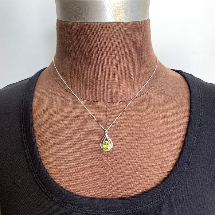 sphene and white gold pendant