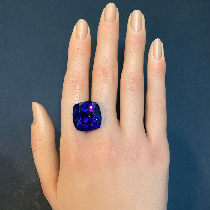 violet blue square cushion tanzanite gemstone red flash