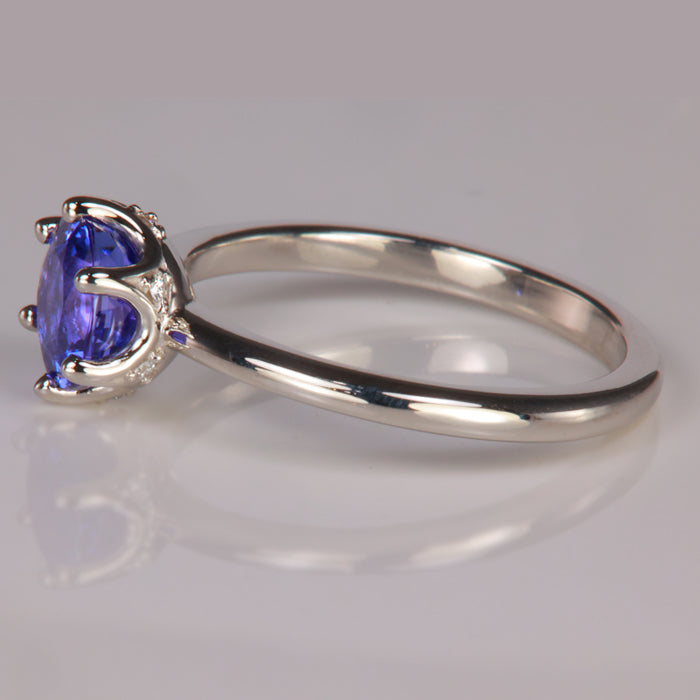 platinum ring with diamond accents and tanzanite gem