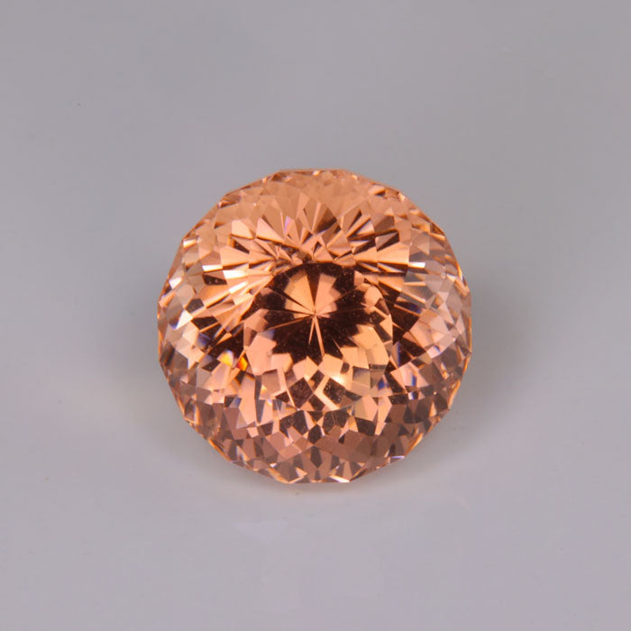 pink orange round portuguese cut tourmaline gemstone