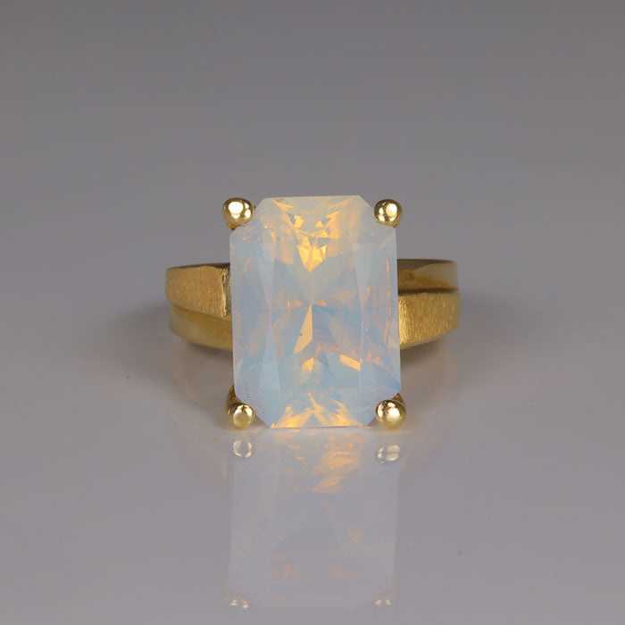opal ring translucent white in yellow gold