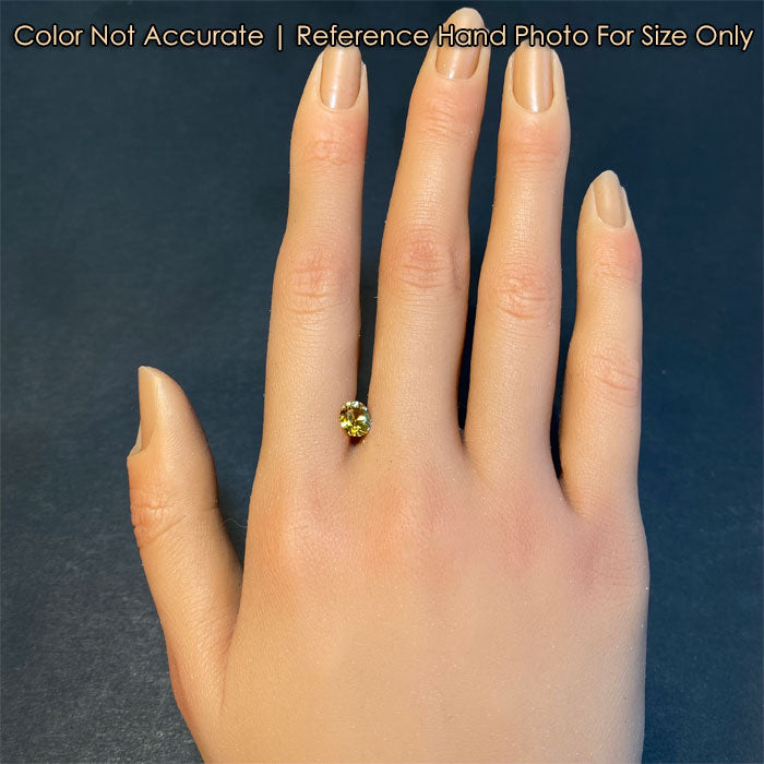 oval yellow sapphire size on hand