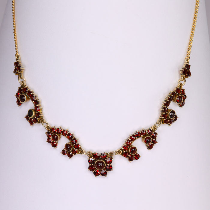 garnet and yellow gold necklace