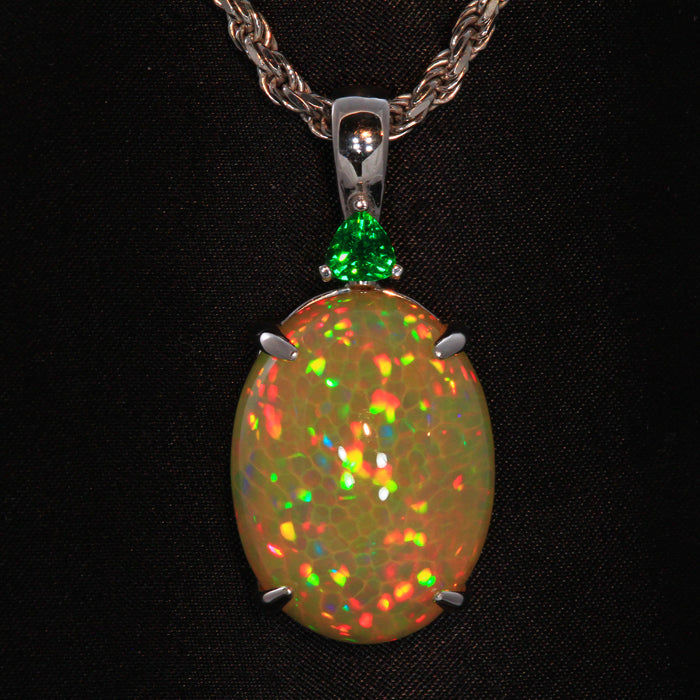 White Gold Welo Opal Pendant with a Trilliant Tsavorite