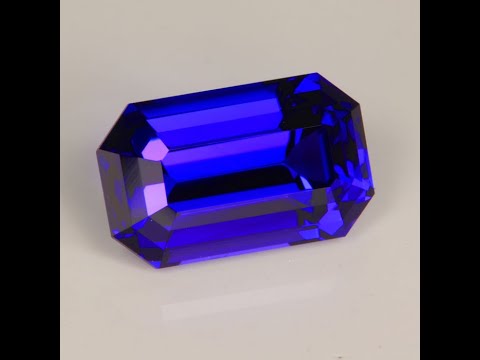 Natural Untreated Blue Violet Emerald Cut Tanzanite Gemstone 7.04cts (Red Flash)